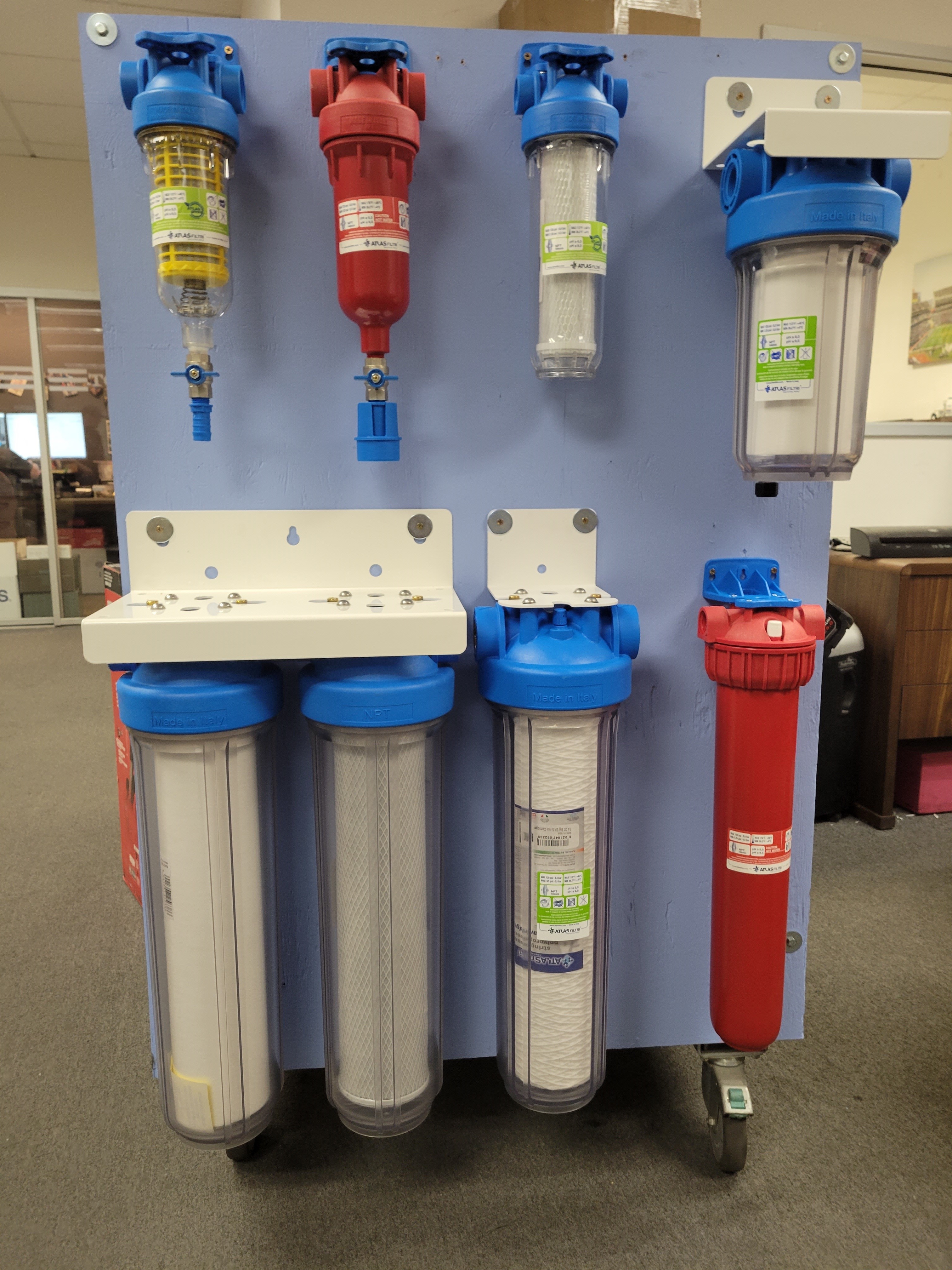 Amber Water Pros Water Filters - A faucet with clean water from an activated-carbon water filter.