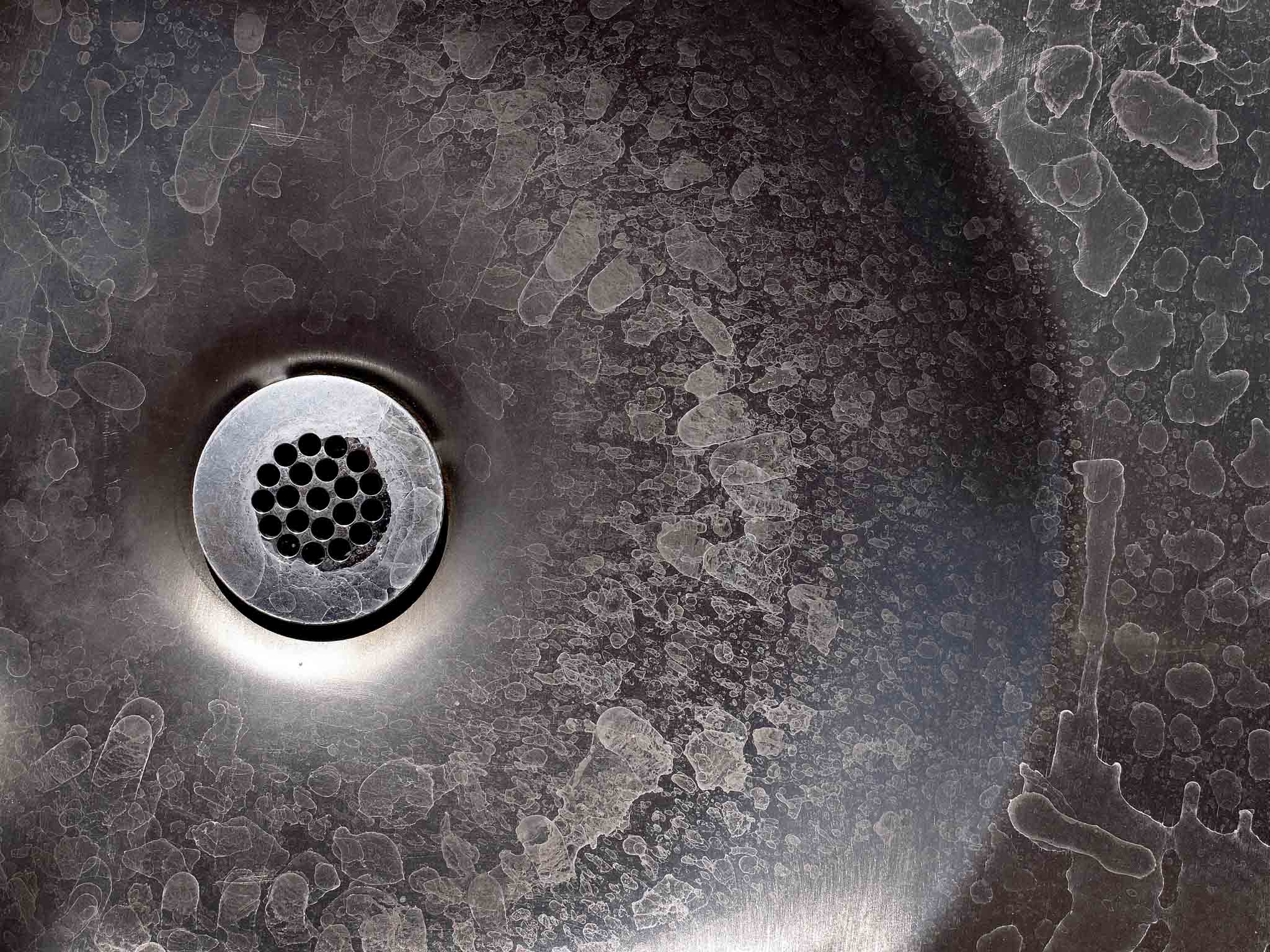 A New York / Pennsylvania  sink with hard water stains.