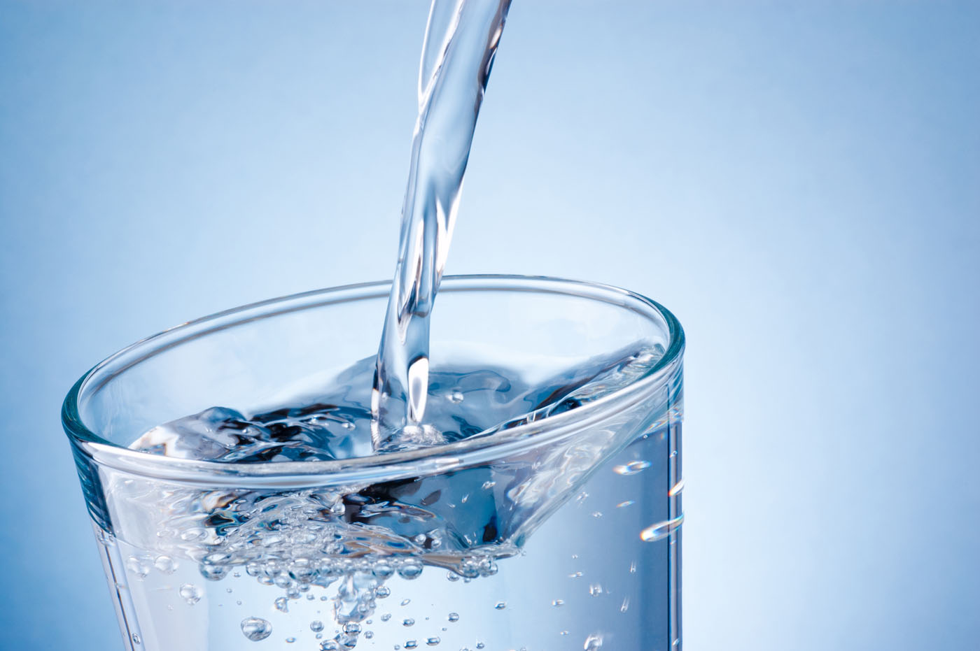 Clean water being poured into a glass, contact us today for water well pump service in New York / Pennsylvania , New York / Pennsylvania .